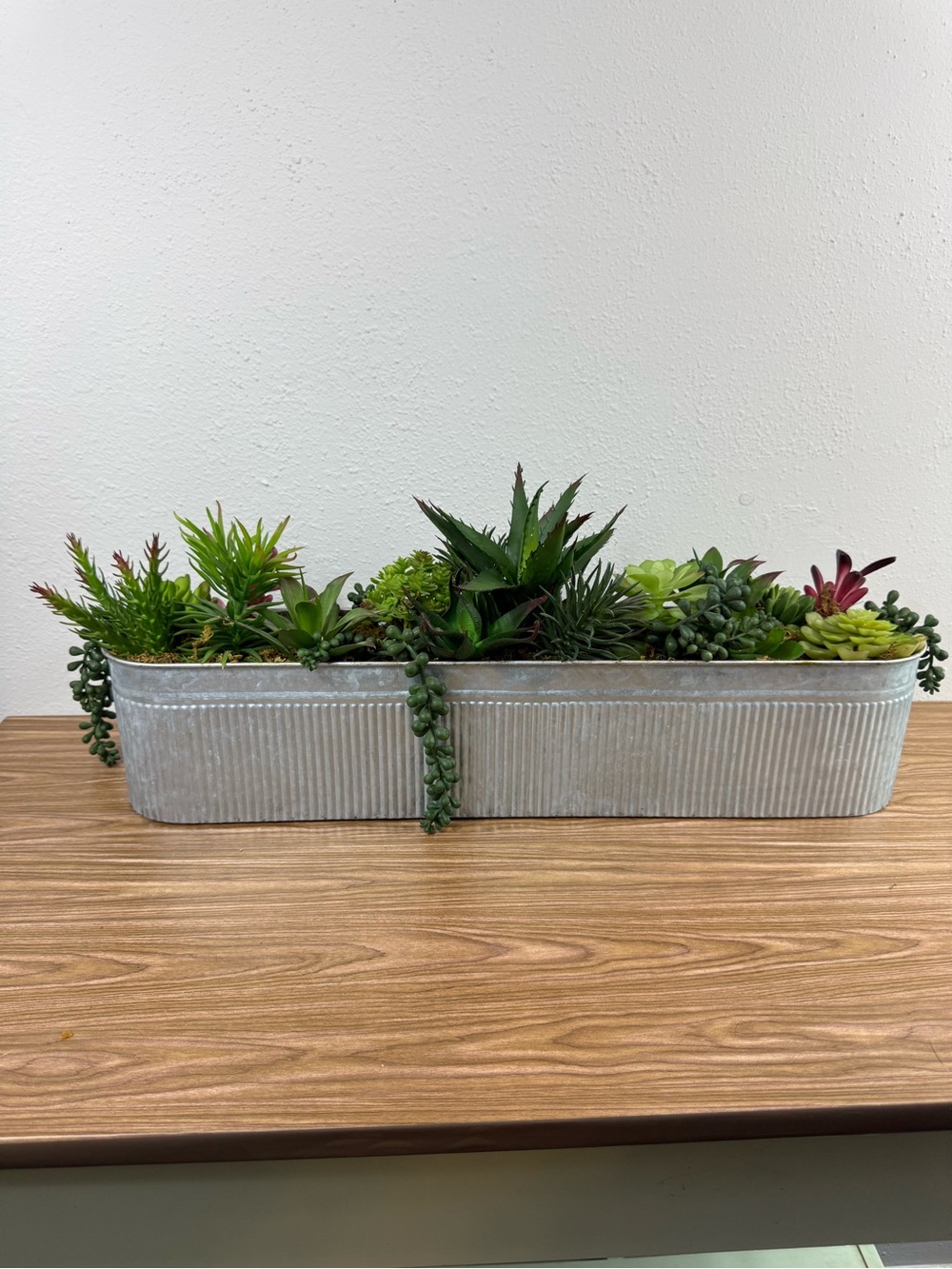 Faux Succulent Centerpiece in Gray Corrugated Planter
